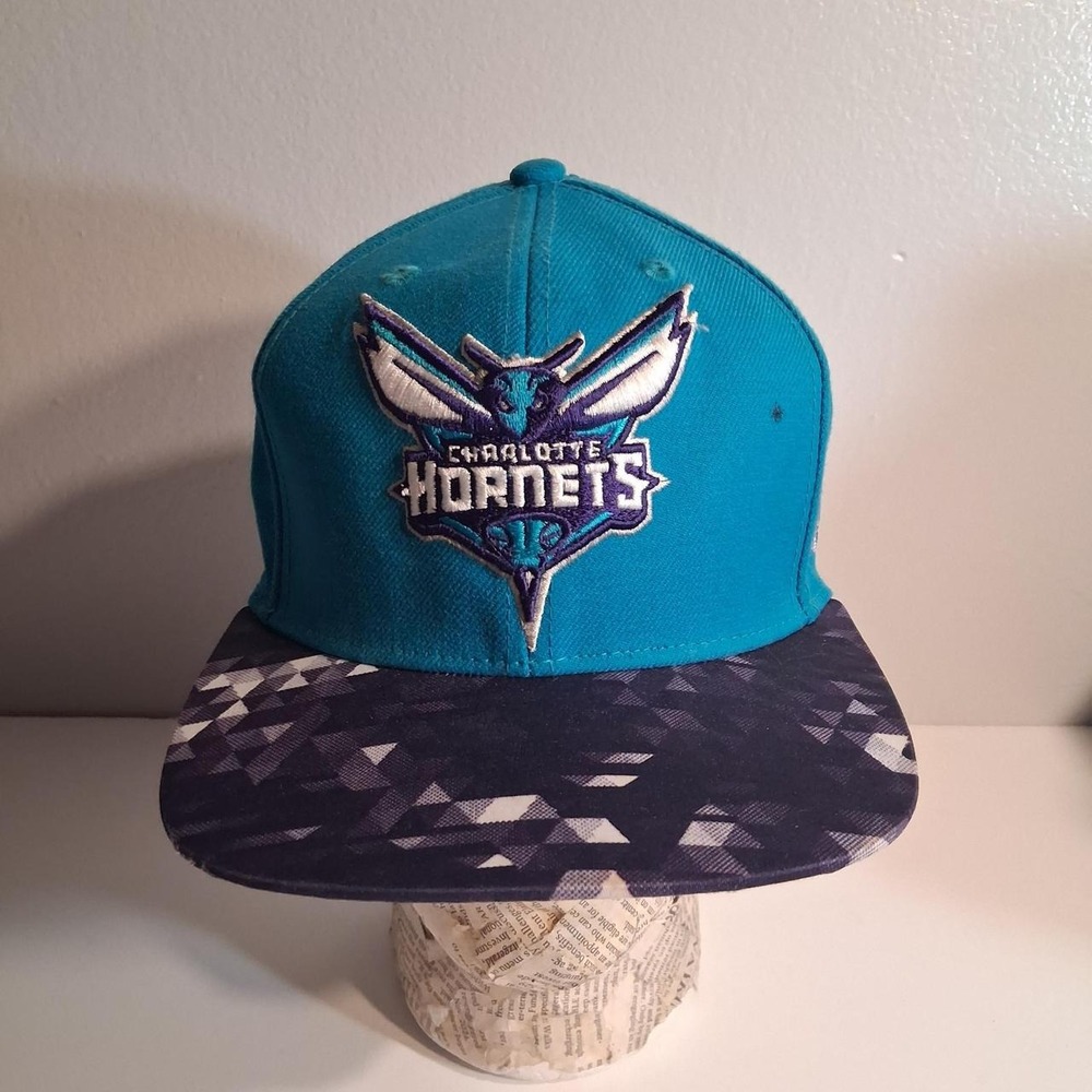 Charlotte Hornets teal & purple cap with purple pattern on the brim NBA